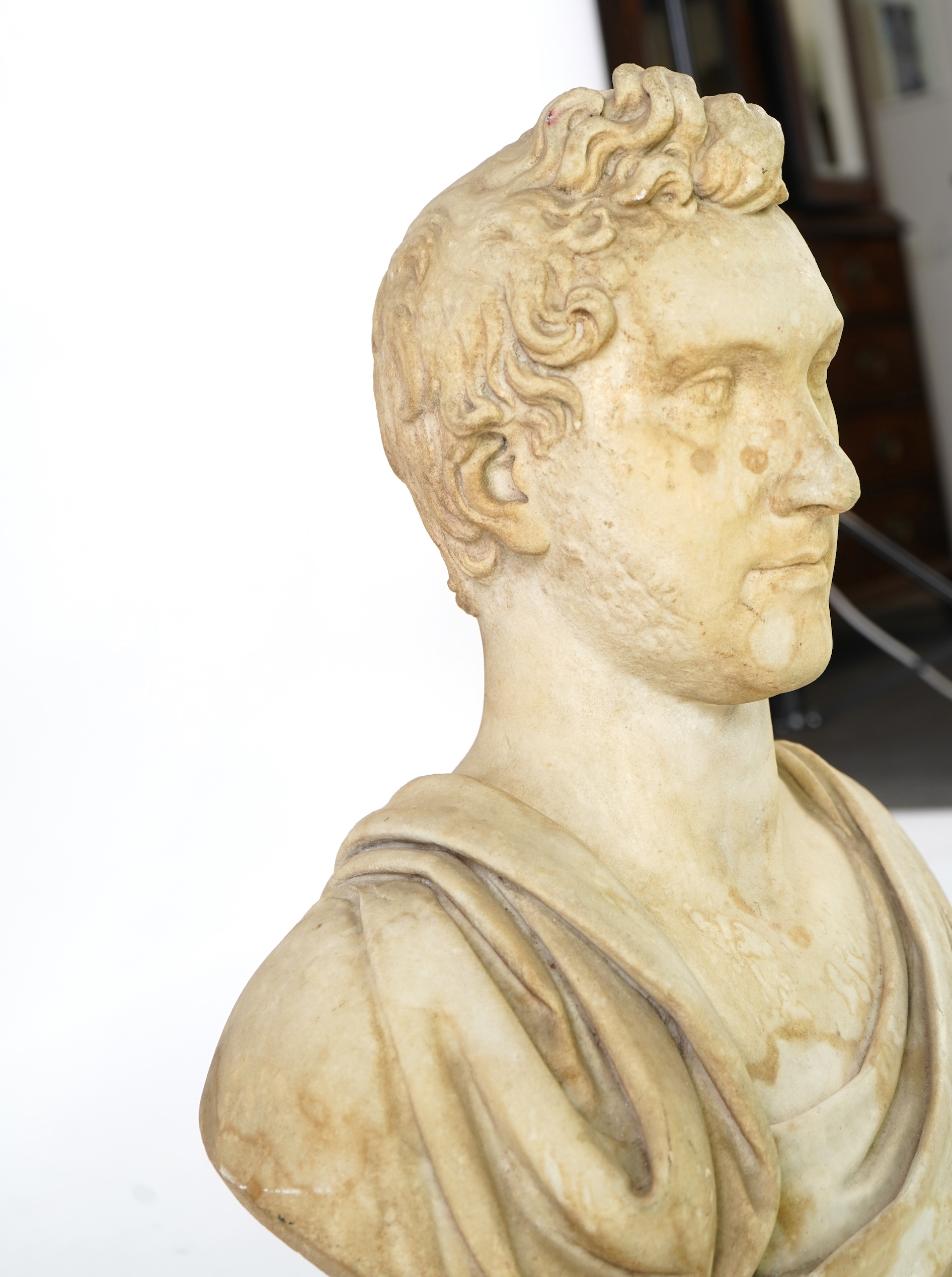 A neoclassical life size marble bust of a gentleman, early 19th century